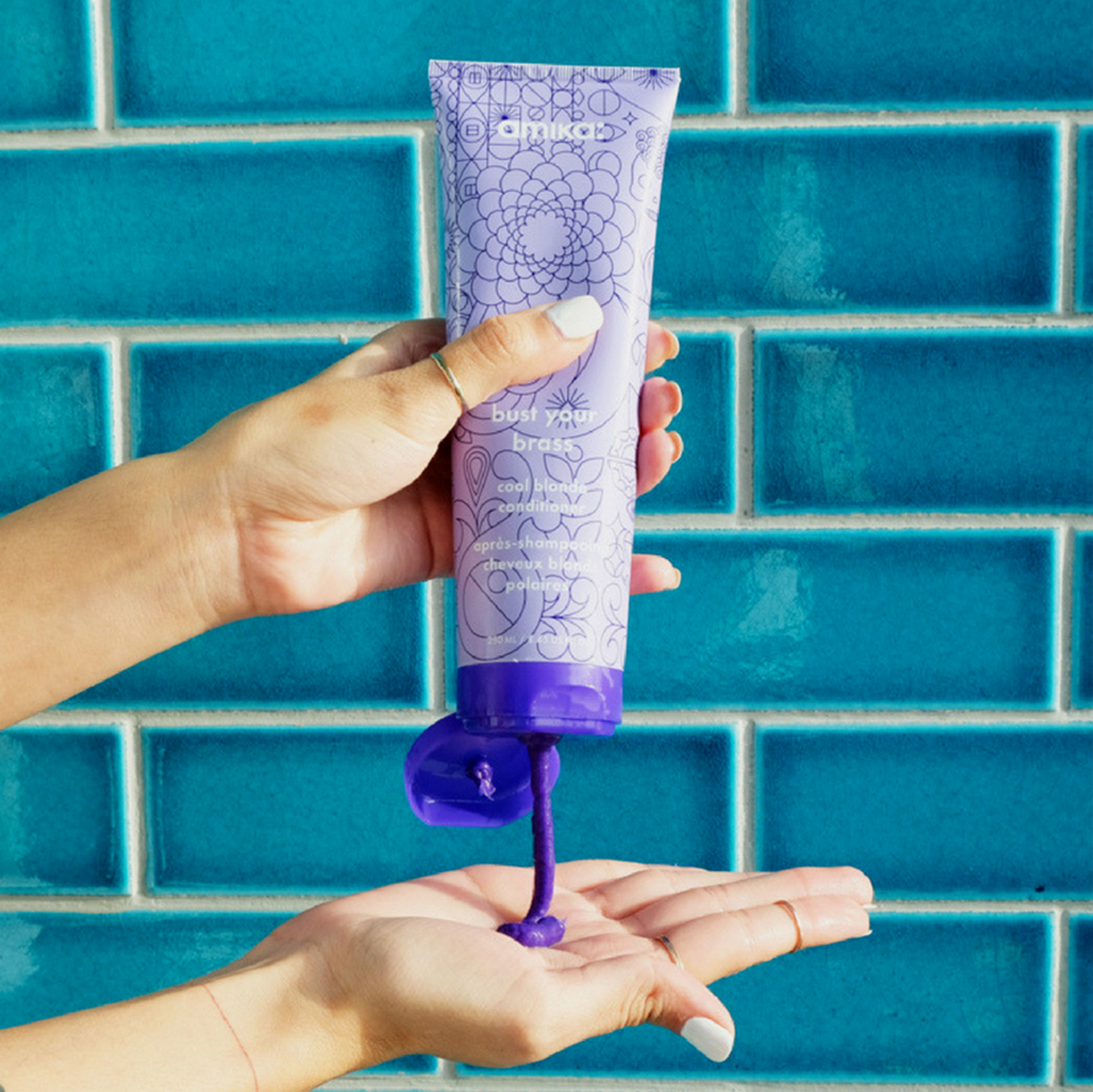 bust your brass cool blonde conditioner | amika